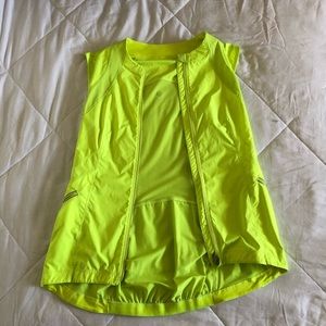 Vest with a low back shirt piece. Very vibrant and for active wear style.